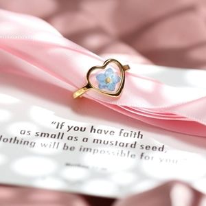 SOLD!! NEW BEAUTIFUL FLOWER AND MUSTARD SEED RING